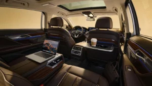 Luxurious interior of a saloon car designed for business travelers with leather seats and modern amenities